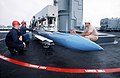 A guided missile training round being loaded into a Mark 26 launcher, USS Arkansas