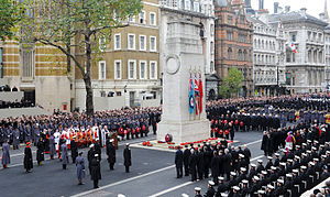 A military parade around a monument
