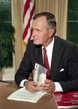 George H.W. Bush holds up a bag of crack cocaine during his Address to the Nation on National Drug Control Strategy
