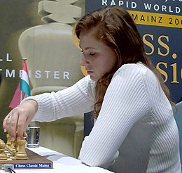 Judit Polgár playing a chess move