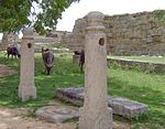 Two Pillars and Group of Mortar Wheels Outside Zenana Enclosure