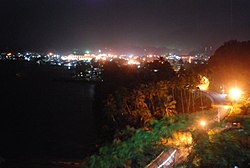 Skyline of Bislig on night time showing the nearby Bislig Bay taken at the Ocean View Park in Barangay Comawas