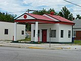 Former Miami Marathon Oil Company service station. Building was last used as a salon.