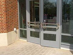 Stylized door handles at the entrance to the 2010 building