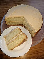 White layer cake with frosting