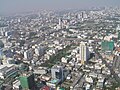 The view north from Bangkok's Baiyoke Tower II with the Victory Monument visible left of centre