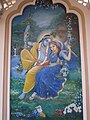 Wall art of Radha Krishna on swing inside the temple