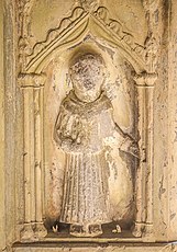 Statue in Askeaton Abbey, Ireland, claimed to cure toothache, 14th–15th century