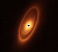 Image 71Astronomers used the James Webb Space Telescope to image the warm dust around a nearby young star, Fomalhaut, in order to study the first asteroid belt ever seen outside of the Solar System in infrared light. (from Cosmic dust)