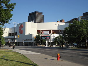 Evening photograph on a clear day of a sports arena in the city of Hamilton's downtown.