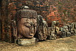 Major ruined Buddhist site with 3 monasteries and hundreds of stupas; abundant sculpture