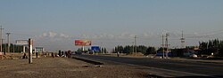 Outside of Aksu City with Tian Shan range in the background