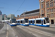 Renovated Amsterdam Centraal Westzijde tram station with Combinos on tram lines 2 , 12 and 13.