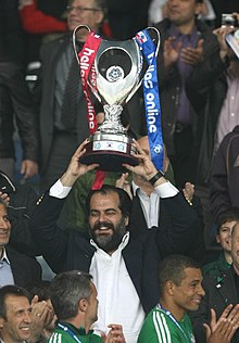 The president of PAO, Nikolas D. Pateras, with the Greek Football Cup (2010).