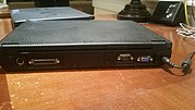 Back view of an IBM ThinkPad 390, showing the PS/2 mouse, DB25f printer, DE9m serial, DE15f, VGA and charger ports