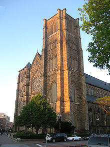 Exterior of a large, tan-colored church