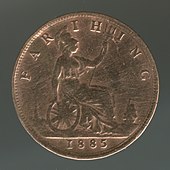 A copper coin with Britannia on it