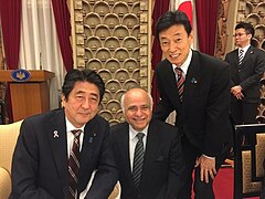 Ryuko Hira with Prime Minister of Japan - Shinzo Abe and Minister of Economy, Trade, and Industry of Japan - Yasutoshi Nishimura