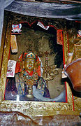 Statue of Guru Rinpoche in his meditation cave at Yerpa
