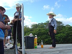 Two plain dressed Old Colony Mennonite boys near Lamanai in Belize