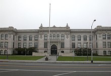 A three-story high school building with classical features