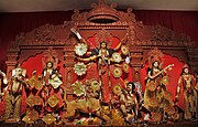Durga Puja is a multi-day festival in Eastern India that features elaborate temple and stage decorations (pandals), scripture recitation, performance arts, revelry, and processions.[77]