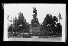 Black and white photo of statue of Columbus, Mexico.