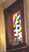 Stained glass window on the staircase hall which leads to the second floor.