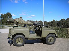 An ex-Australian Army M40 recoilless rifle mounted on a Land Rover on display in the grounds of the Australian War Memorial