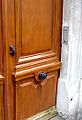 A door handle in the center of a door in Paris