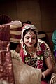 Shy smile of a bride in a Hindu Indian wedding