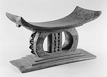 a black and white image of an Akan stool