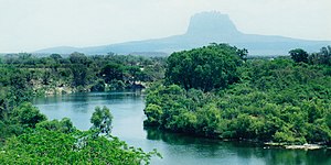 Rio Guayalejo at Highway 80 with silhouette of Cerro del Bernal, Municipality of Gonzlaez, Tamaulipas, Mexico (April 2001)