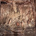 India, ca. 8th century C.E. Siva playing a stick-zither vina for Parvati in Ellora Caves, image in side passage of Kailash temple (cave 16)