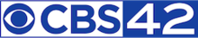 A white box with a blue CBS eye and the letters C B S next to a blue box containing a wide, sans serif numeral 42 in white