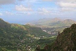 View of the Valley of Ribeira Brava, in the bottom of the middle part is the village of Talho and on top is the east of the island