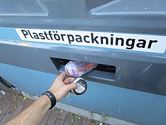 Wrapping up the plogging session at the local recycling station, Gothenburg (Sweden) on July 11, 2019. Here recycling plastic containers.