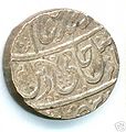 A silver ashrafi issued by Asaf-ud-Daula from the Najibabad mint in AH 1211 (1796/7), regnal year 38