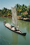 Traditional merchant boat on the backwaters (Kerala)