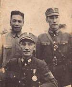 World War II era photograph, featuring Chiang Kai-shek and his two sons.