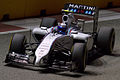Valtteri Bottas driving the Martini-sponsored the Williams FW36 at the 2014 Singapore Grand Prix.