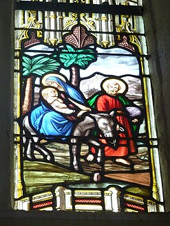 Stained glass window in the église Notre-Dame de l'Assomption, "La Fuite en Egypte"-The flight into Egypt.