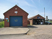 Happisburgh lifeboat station which was demolished in 2012 as it was in imminent danger of falling into the sea. The station had moved to a temporary station in 2003, although these building had been used for storage and training.