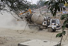 Gomti riverfront; heavy machinery over the riverbed