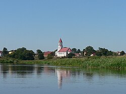 Church of Corpus Christi in Suraż seen from the Narew riverside