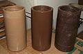 Brown wax cylinders showing various shades (and mold damage)