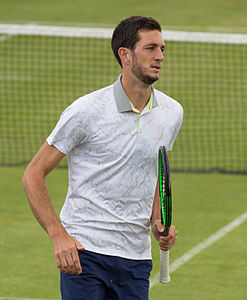 James Ward of Great Britain playing doubles with Matthew Ebden of Australia at the Aegon Surbiton Trophy in Surbiton, London.