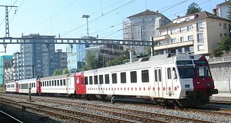 Leased and modernized RBDe 567 316 and ABt 204 with tpf B 361 and 369 in Fribourg on 29 September 2006