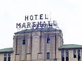 Sign on top of the abandoned Hotel Marshall in 2004