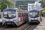 2 Metro Cammell EMU (AC) meet at University station on 30 December 2021